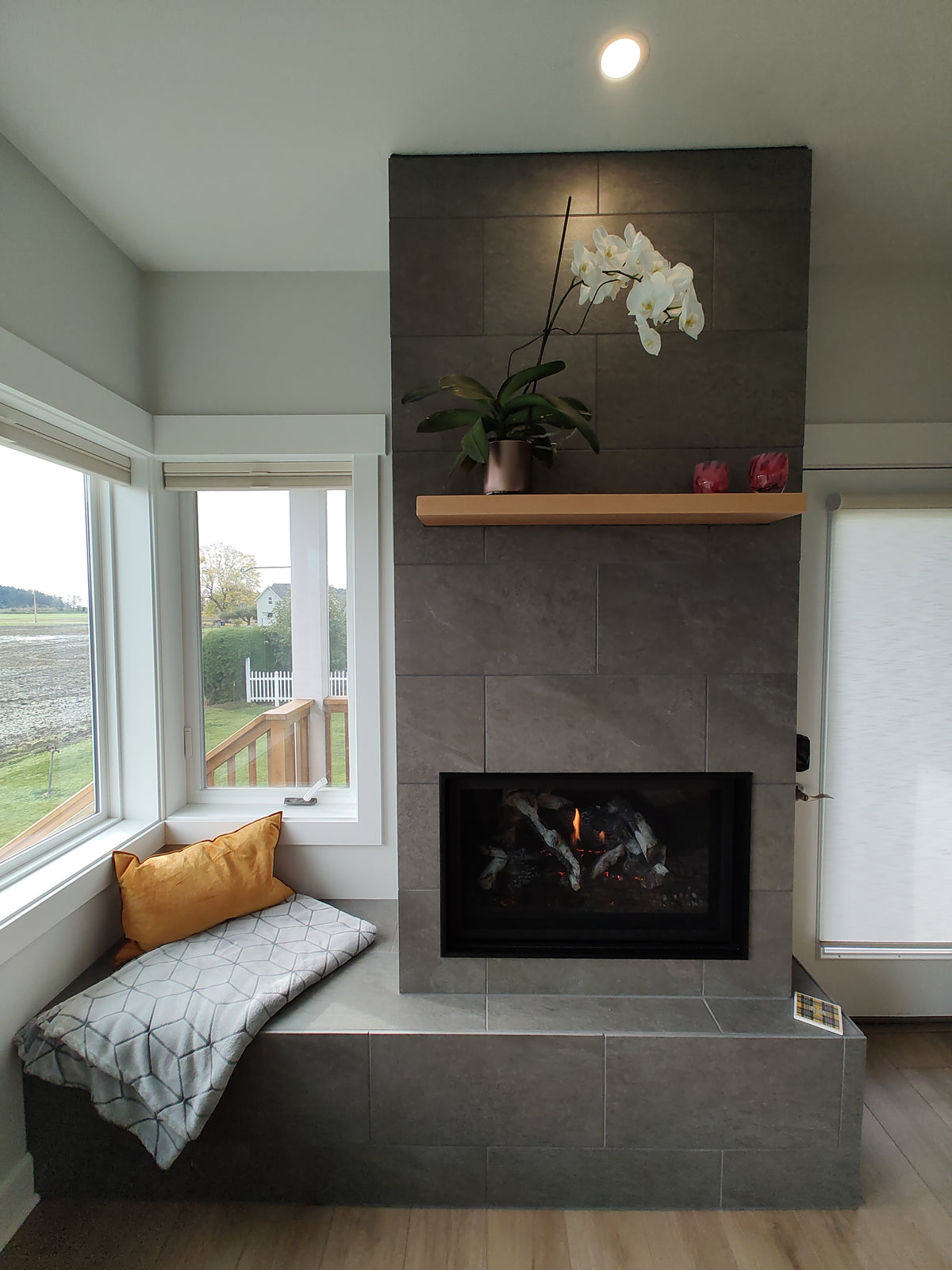 Tile, framing and fireplace w mantel installation